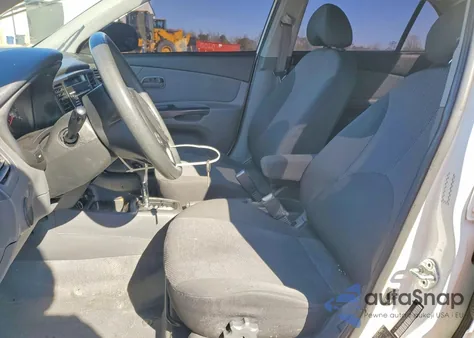 2011 Kia Rio Base z USA, uszkodzony, nr VIN KNADH4A38B6913922